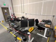 Work Space. All Contents Included. (4) Adjustable Standing Desks