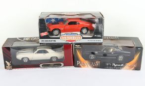 Three 1:18 Scale Die Cast Metal Cars boxed, 