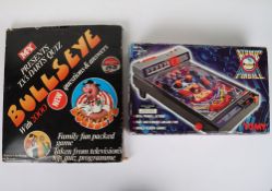 Two Vintage Games Atomic Pinball by Tomy and Bullseye Darts Game by M.Y. 