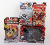 Four Transformers action figures, Hasbro, Tomy Takara, Universe, Revenge of the Fallen, Robots in Di