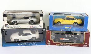 Four 1:18 Scale Die Cast Metal Cars boxed, 
