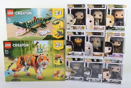 Two Lego Creator sets and Eighteen Vinyl Pop figures Funko, 