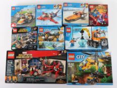 Nine Retired Lego Sets City, DC Comics, Marvel Super Heroes sealed boxed. 