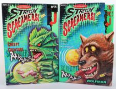 Two boxed Manley Quest Electronic 'Stretch Screamers' Creepy Creature Wolfman. 