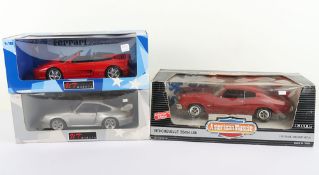 Three 1:18 Scale Die Cast Metal Cars boxed, 
