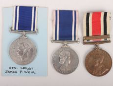 A collection of 3 long service medals to the Police