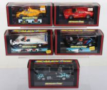 Five boxed Scalextric slot cars,