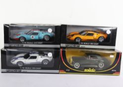 Three boxed Ford GT boxed 1:18 scale model cars,