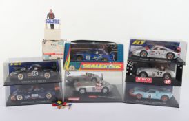 Seven Scalextric Cars new in box.