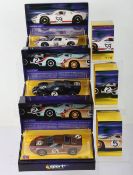 Three boxed Scalextric Sport Ford GT40 Le Mans slot cars,