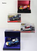 Four boxed SCX TecniToys 1:32 scale slot cars,