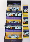 Three boxed Scalextric Sport Ford GT40 Le Mans slot cars,