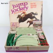 Two Scalextric racing sets and Tri-ang Jump Jockey, 25-33