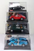 Three boxed Carrera Exclusiv slot cars,