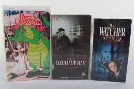 Three Sealed VHS Tapes.