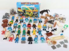 Collection of Vintage Playmobil figures.