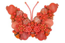 A STANLEY HAGLER ORANGE BUTTERFLY BROOCH