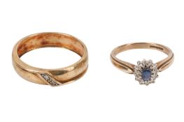 TWO 9CT GOLD DIAMOND RINGS