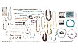 A GROUP OF COSTUME AND SILVER JEWELLERY