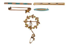 A GROUP OF FIVE BROOCHES