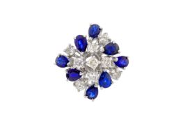 A SAPPHIRE AND DIAMOND RING