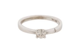 A SINGLE-STONE DIAMOND RING 