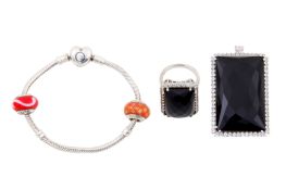 A PANDORA SILVER BRACELET AND A BLACK ONYX AND WHITE TOPAZ SILVER SUITE 