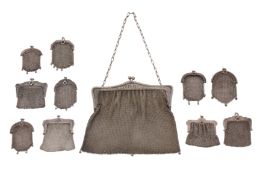 A collection of nine French silver mesh small purses