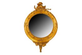 A REGENCY PERIOD GILTWOOD CONVEX MIRROR