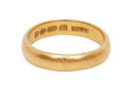 A 22CT YELLOW GOLD BAND, CIRCA 1969