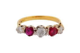 A FIVE-STONE RUBY AND DIAMOND RING