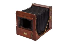 A Wratten & Wainwright Half Plate Tailboard Mahogany & Brass Camera 