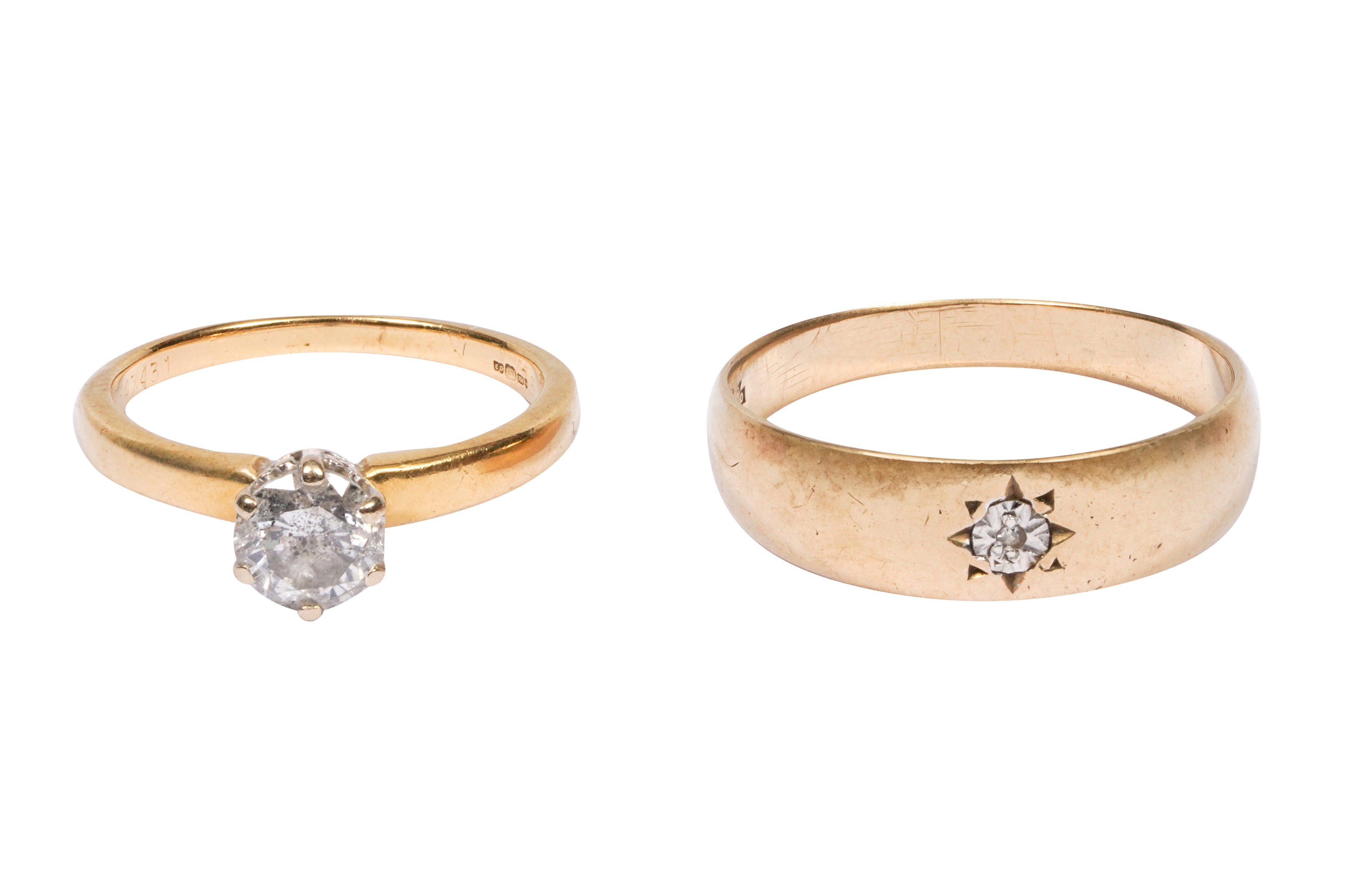 TWO SINGLE-STONE DIAMOND RINGS