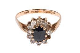A SAPPHIRE AND DIAMOND IMITATION RING