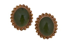 A PAIR OF NEPHRITE STUD EARRINGS