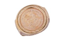 A KRUGERRAND-REPLICA COIN RING