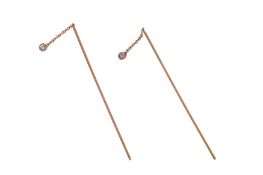 A PAIR OF WHITE SAPPHIRE PIN STUDS