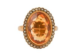 BRAVINGTONS | A CITRINE AND SEED PEARL RING, CIRCA 1947