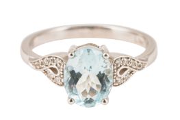 AN AQUAMARINE AND DIAMOND RING