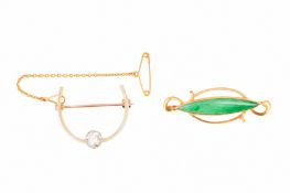 A PAIR OF BROOCHES