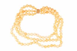 A YELLOW CALCITE BEAD NECKLACE