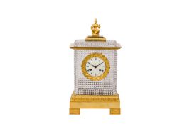 MANNER OF BACCARAT; A FRENCH CRYSTAL AND ORMOLU MANTEL CLOCK