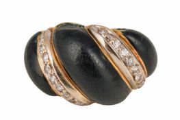 AN ONYX AND DIAMOND BOMBÉ RING