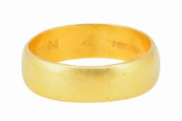 A 22CT YELLOW GOLD BAND, CIRCA 1965
