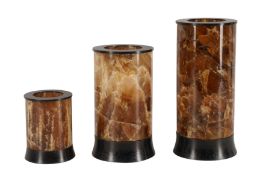 A SET OF THREE CYSTALLIZED STONE VASES