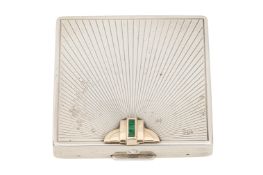 An early 20th century American sterling silver, gold and emerald compact, New Jersey circa 1920 by W
