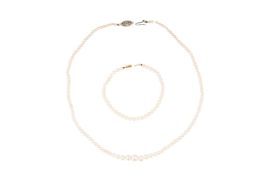 A PEARL BRACELET AND NECKLACE