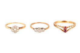 THREE GEM-SET RINGS