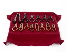 A collection of fourteen pairs of nutcrackers
