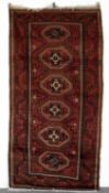 A Belouch long rug